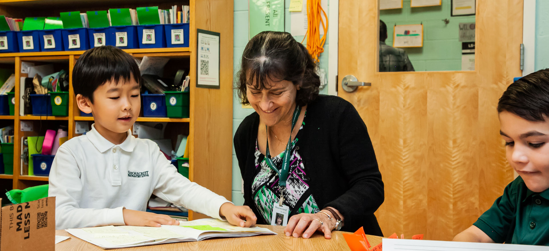 Nancy L. Spencer, Head of School in the Shorecrest first grade with students.