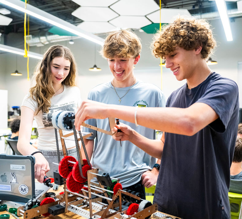 Students programming robot